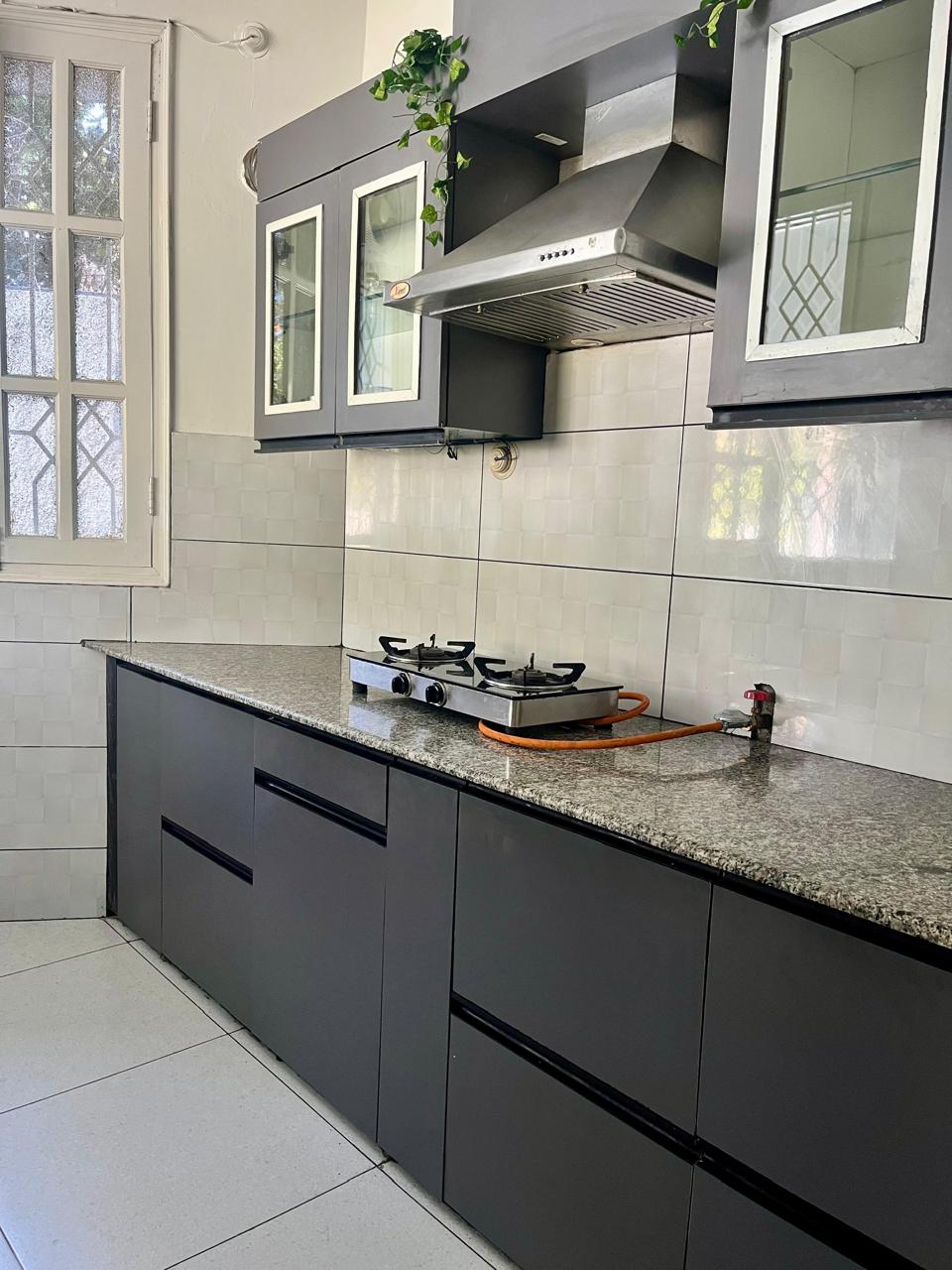 Fully equipped kitchen at AruBhi Cottage Dehradun