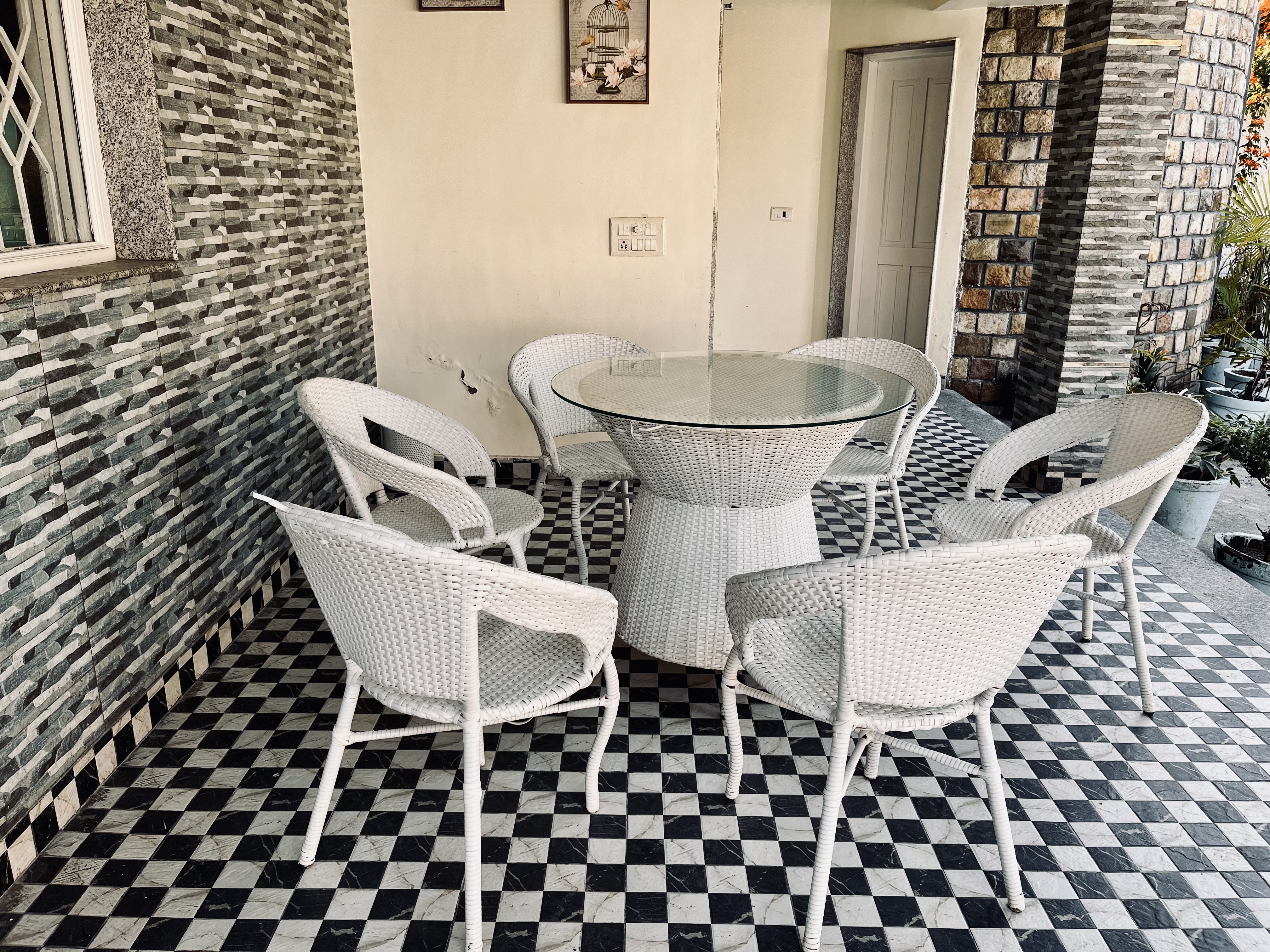 Patio seating area at AruBhi Cottage Dehradun