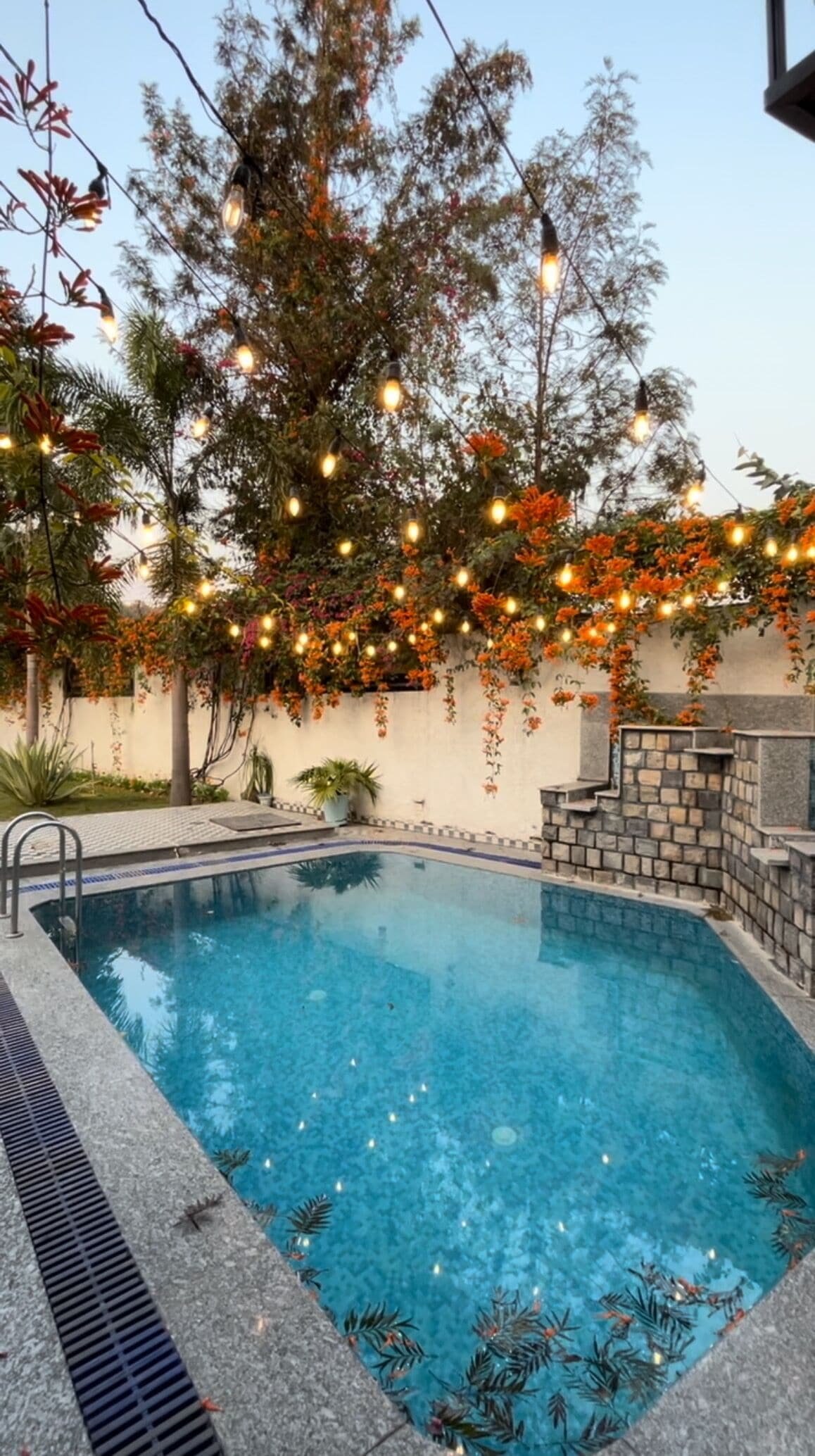 Private swimming pool at night — AruBhi Cottage Dehradun